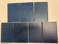 Lot of 7 (24-27, 33, 36, 37 Ed) Handbook of United States Coins Blue Books